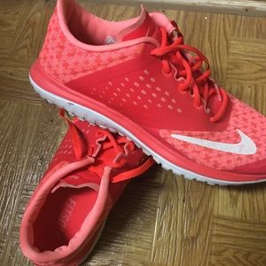 Neon orange 8.5 Womans Nike shoes.